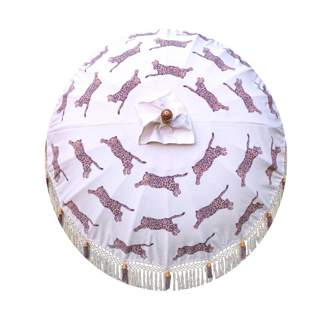 East London Parasol Company Bali Bamboo 2m garden umbrella. Racing leopards leopard print. Handmade and handpainted with fringing and tassels in shades of white