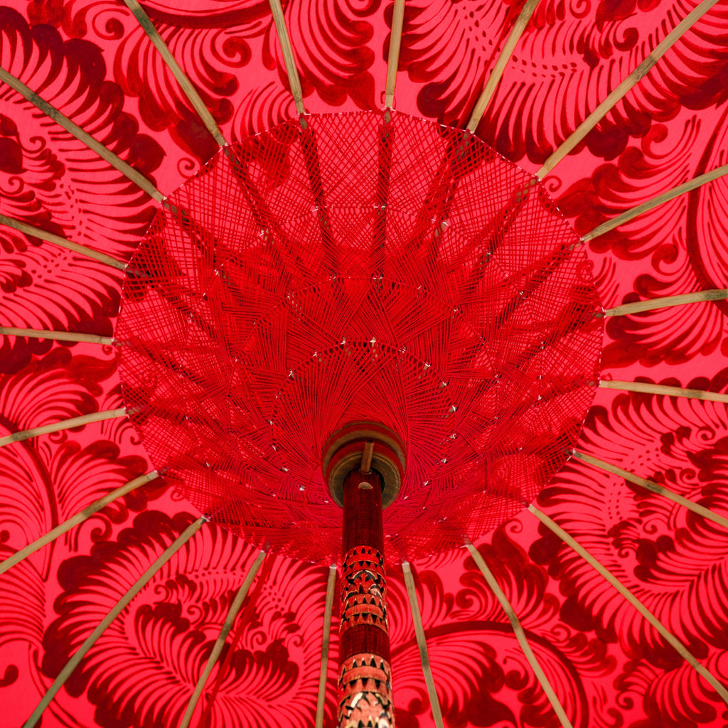 East London Parasol Company Bali Bamboo 2m garden umbrella. Red and Gold. Handmade and handpainted with fringing and tassels in shades red