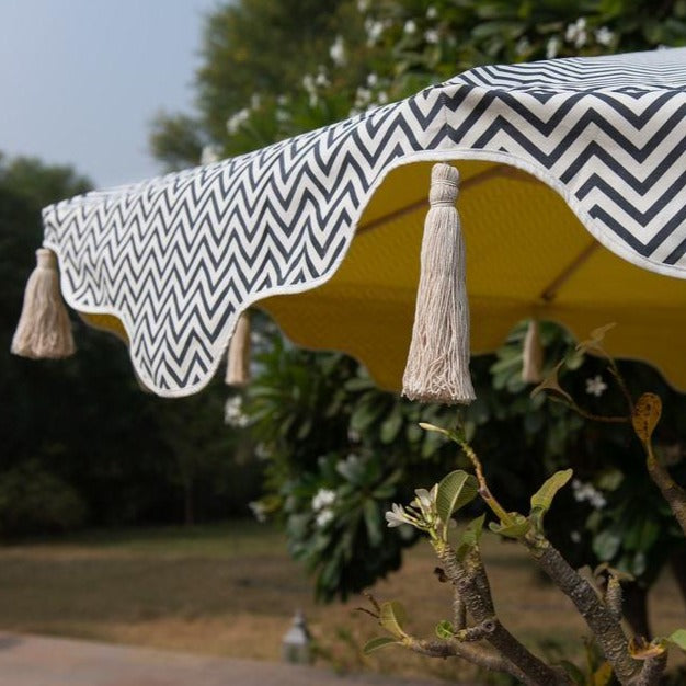 Grey Aretha Octagonal Parasol - Zig Zag pattern side shot showing cream tassels