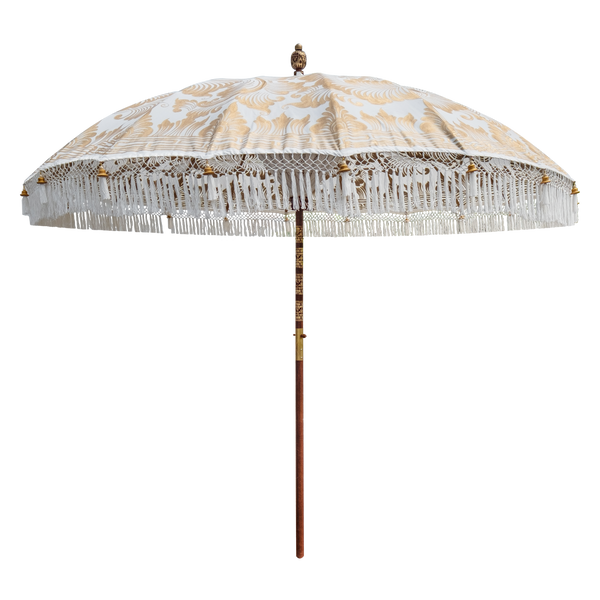 white and gold hand made garden umbrella balinese