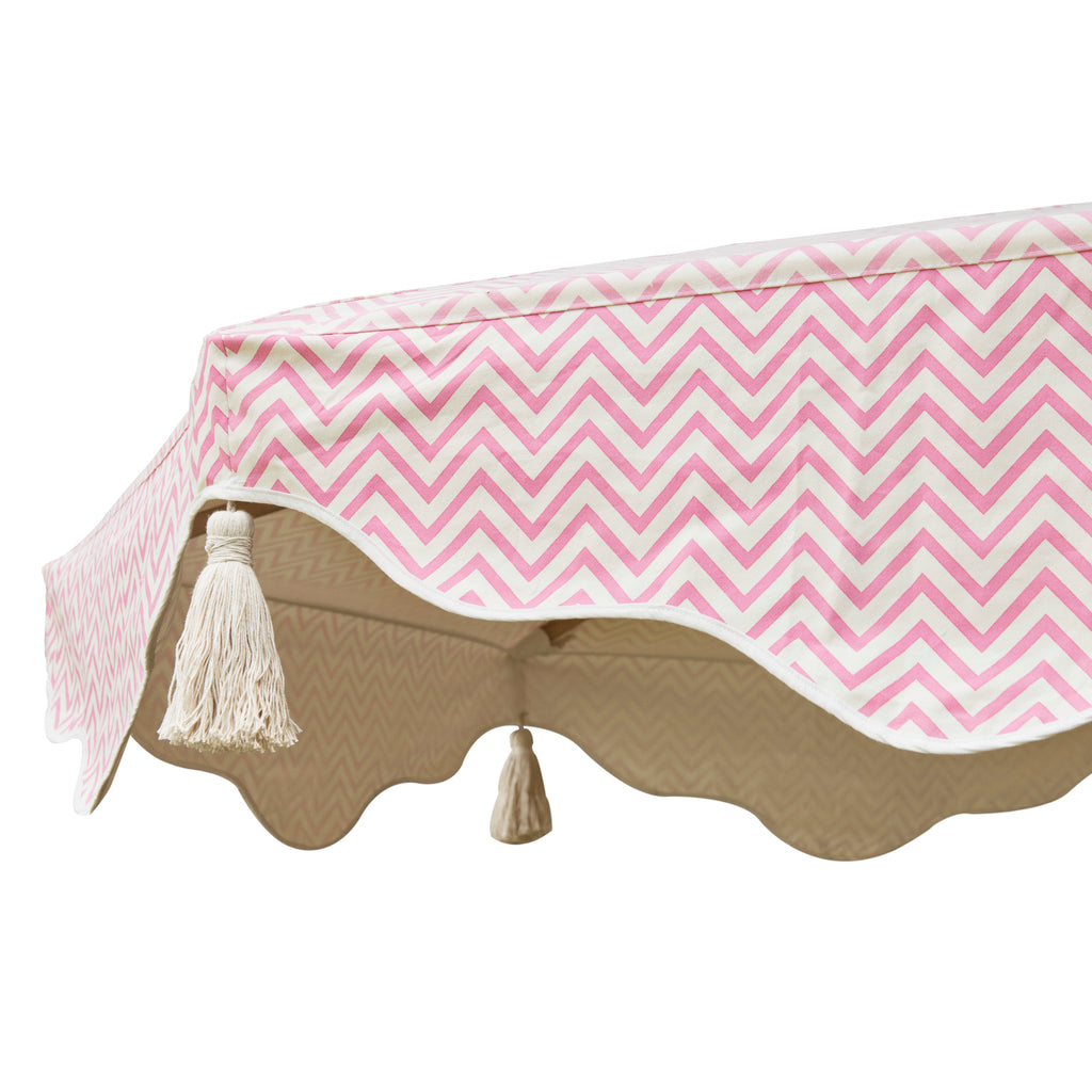 Pink Aretha Octagonal Parasol showing pink zig zap pattern on canopy and white tassels