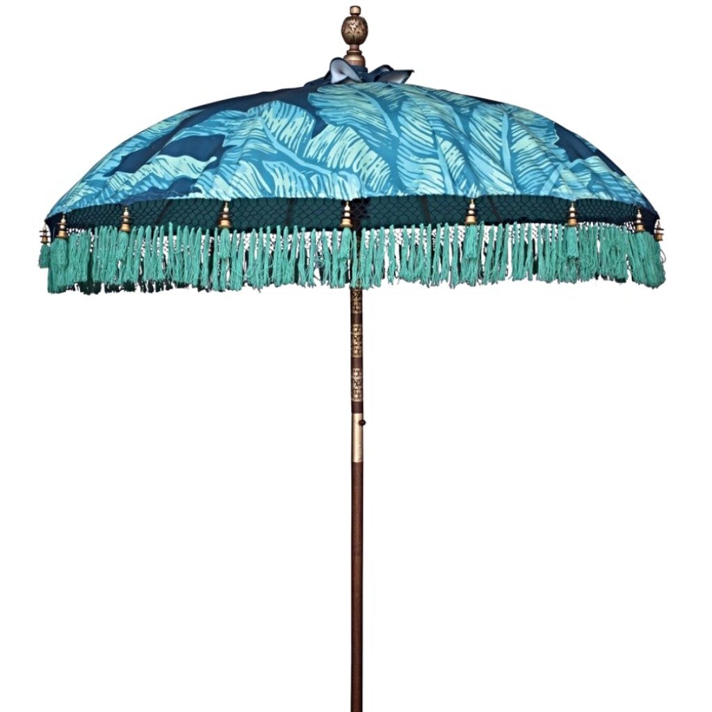 Nina parasol. Digital printed waterproof canvas dark blue palm leaf banana leaf design blue and green. East London parasol company garden umbrella made in bali