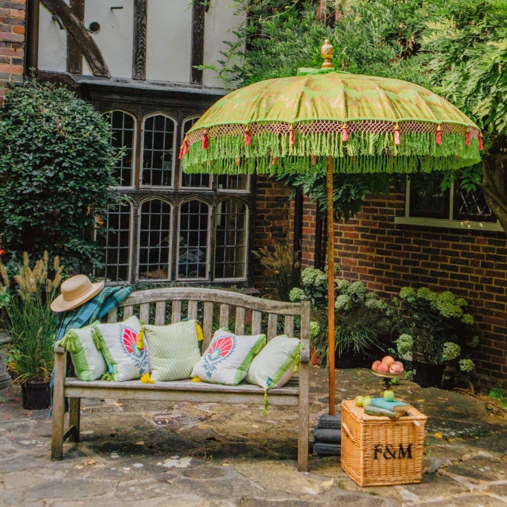 East London Parasol Company Bali Bamboo 2m garden umbrella. Jane- lime green and gold with pink and green tassels. Handmade and handpainted.